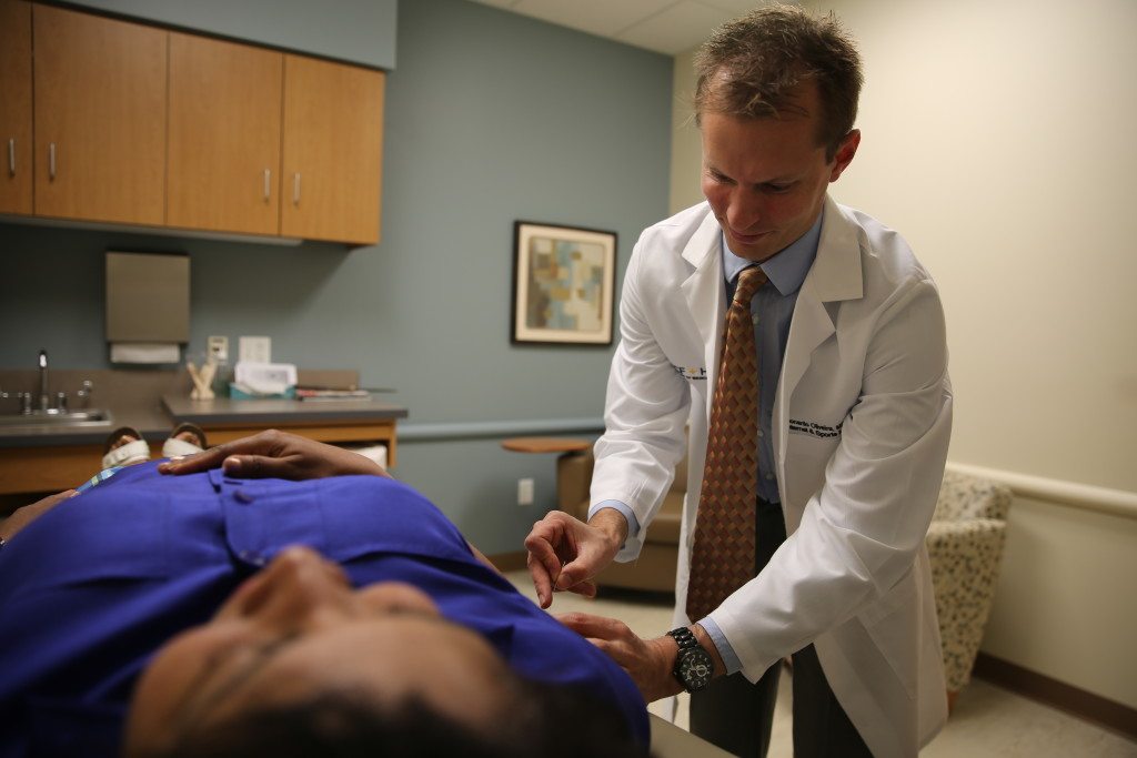 Acupuncture performed by Dr. Smith. Common ailments that can be treated by acupuncture include things like joint pain, asthma, sleep problems, back and neck pain and more.